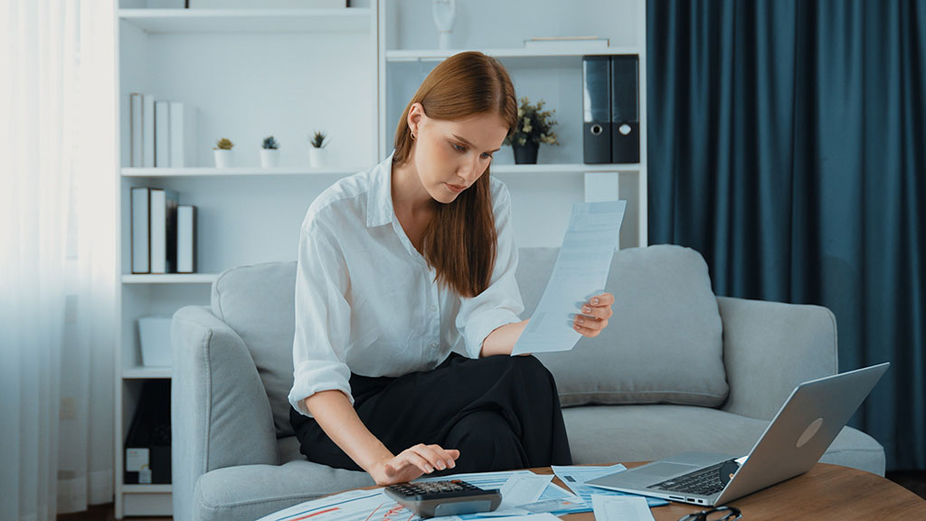 Woman Renter Assessing Income and Expenses